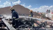 Rescuers from State Emergency Service of Ukraine work on the site hit by a Russian rocket strike, amid Russia's attack on Ukraine, in Chernihiv, Ukraine, August 19, 2023, in this screengrab obtained from a handout video. State Emergency Service of Ukraine/Handout via REUTERS THIS IMAGE HAS BEEN SUPPLIED BY A THIRD PARTY MANDATORY CREDIT 