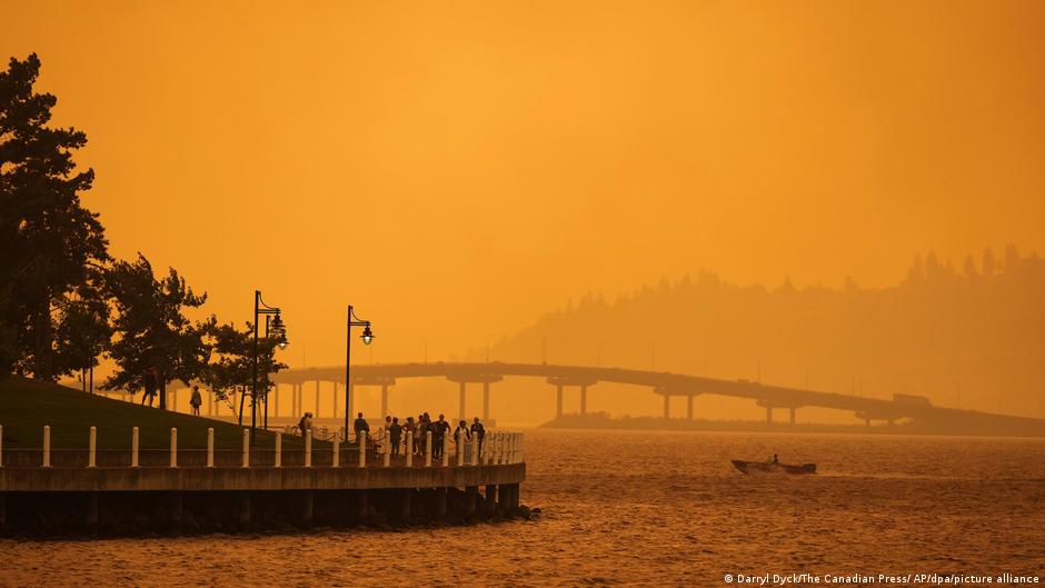 Tens of thousands flee western Canada wildfires