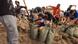 A crowd of California residents filling up sandbags A crowd of California residents filling up sandbags