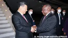 230822 -- JOHANNESBURG, Aug. 22, 2023 -- Chinese President Xi Jinping is warmly greeted by South African President Cyril Ramaphosa upon his arrival at the OR Tambo International Airport in Johannesburg, South Africa, Aug. 21, 2023. Xi arrived in Johannesburg on Monday to attend the 15th BRICS Summit to be held here, and pay a state visit to South Africa. SOUTH AFRICA-JOHANNESBURG-XI JINPING-BRICS SUMMIT-STATE VISIT-ARRIVAL HuangxJingwen PUBLICATIONxNOTxINxCHN