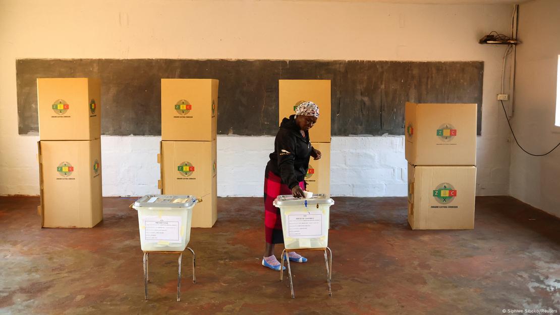  A woman casts her vote during the Zimbabwe general elections in Zimbabwe.