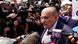 Former Trump attorney Rudy Giuliani speaks with the media after being processed at the Fulton County Jail. Former Trump attorney Rudy Giuliani speaks with the media after being processed at the Fulton County Jail.