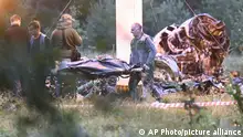 24.08.2023
People carry a body bag away from the wreckage of a crashed private jet, near the village of Kuzhenkino, Tver region, Russia, Thursday, Aug. 24, 2023. Russian mercenary leader Yevgeny Prigozhin, the founder of the Wagner Group, reportedly died when a private jet he was said to be on crashed on Aug. 23, 2023, killing all 10 people on board. (AP Photo)
