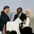 South African President Cyril Ramaphosa, centre right speaks to China's President Xi Jinping as President of Brazil Luiz Inacio Lula, left, and Prime Minister of India Narendra Modi look on, at the BRICS summit in Johannesburg, South Africa