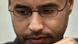 Saif al-Islam holding a press Saif al-Islam holding a press