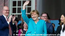German Chancellor Angela Merkel waves to the crowd after her address at the Annual Meeting of the Harvard Alumni Association following the 368th Harvard University Commencement ceremony in Tercentenary Theatre on the campus of Harvard University in Cambridge, Massachusetts on May 30, 2019. Merkel received an honorary degree from the University earlier in the day. Photo by Matthew Healey/ UPI Photo via Newscom picture alliance