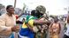 A person embraces a soldier following a military coup in Libreville, Gabon A person embraces a soldier following a military coup in Libreville, Gabon