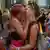 Two people kissing at a Pride Event in July, 2023, in Leipzig