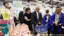 U.S. Ambassador to Japan Rahm Israel Emanuel visits a local market to inspect and buy locally sourced seafoods and agricultural products at a market in Soma City, Fukushima Prefecture on August 31, 2023. Tokyo Electric Power Company Holdings, Incorporated (TEPCO) announced that Fukushima Daiichi nuclear power plant had started to release treated water stored within the premises of the plant into the ocean on August 24th. Since then, the Chinese government has banned the import of seafoods and processed products from Japan.( The Yomiuri Shimbun via AP Images )