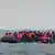 Migranten auf einem Schlauchboot auf dem Ärmelkanal (Archivbild)