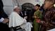 Pope Francis greeting two Mongolian children at the House of Mercy Pope Francis greeting two Mongolian children at the House of Mercy