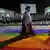 Supporters of Shiite Muslim leader Moqtada Sadr step on a LGBTQ rainbow flag