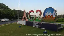 September 5, 2023, New Delhi, Delhi, India: Traffic moves past a model of the G20 logo ahead of the G20 Summit in New Delhi, India on September 5, 2023. India will host the 18th G20 Summit from September 9-10 in New Delhi. (Credit Image: Â© Kabir Jhangiani/ZUMA Press Wire