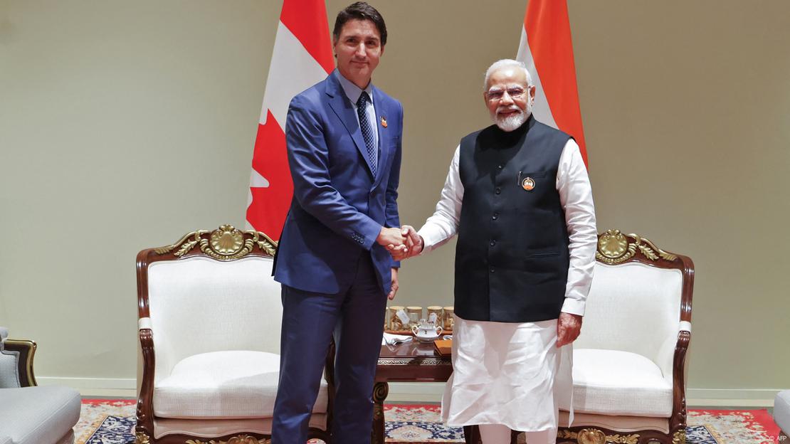 Os primeiros-ministros Narendra Modi e Justin Trudeau Os primeiros-ministros Narendra Modi e Justin Trudeau