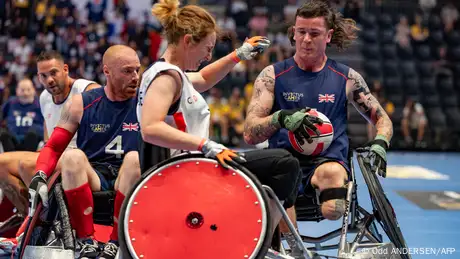 Athletes from the UK and France compete in the wheelchair rugby competition.