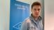 Roman Anin looks to the camera with a Free Media Awards banner behind him in Hamburg Roman Anin looks to the camera with a Free Media Awards banner behind him in Hamburg