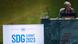 A banner reads SDG Summit 2023 in the foreground with Antonio Guterres seated at the UN in the background A banner reads SDG Summit 2023 in the foreground with Antonio Guterres seated at the UN in the background