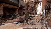 16.09.2023***Tairek Almahgop, 44, a flood survivor gestures as he walks throughout a street, that was hit by a powerful storm and heavy rainfall, in Derna, Libya September 16, 2023. REUTERS/Zohra Bensemra