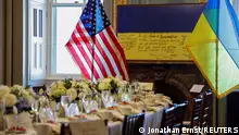 21/09/2023 *** A framed flag signed by front-line Ukrainian fighters in Bakhmut and presented to the U.S. Congress in 2022, sits at one end of the table where Ukrainian President Volodymyr Zelenskiy will meet privately with U.S. House Speaker Kevin McCarthy (R-CA) and other congressional leaders on a visit to the U.S. Capitol in Washington, September 21, 2023. REUTERS/Jonathan Ernst