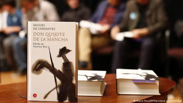 Picture of a book standing upright on a table. It's the original Spanish version of Don Quixote written by Miguel de Cervantes. 