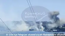 ACHTUNG USER GENERATED CONTENT *** This image taken from UGC video shows smoke rising from the headquarters of Russia’s Black Sea Fleet in Sevastopol, Crimea, Friday Sept. 22, 2023. Ukraine carried out a fiery missile strike Friday on the main headquarters of Russia’s Black Sea Fleet and one serviceman was missing, the Russian Defense Ministry said (Crimean Telegram channel via AP)