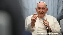 Pope Francis attends a press conference on board an airplane on his flight back from Marseille to Rome, September 23, 2023. Vatican Media/­Handout via REUTERS ATTENTION EDITORS - THIS IMAGE WAS PROVIDED BY A THIRD PARTY.