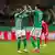 Naby Keita and Justin Njinmah celebrate after Werder Bremen's 2-1 win over Cologne