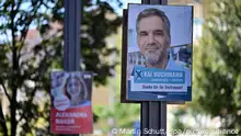 06.09.2023, Thüringen, Nordhausen: Wahlplakate hängen wenige Tage vor der Oberbürgermeisterwahl in Nordhausen in der Innenstadt. Der parteilose Amtsinhaber Kai Buchmann geht trotz eines laufenden Disziplinarverfahrens ins Rennen. Erst vergangene Woche war der zwischenzeitlich suspendierte Oberbürgermeister ins Rathaus zurückgekehrt. Gegen ihn treten bei der Wahl am 10. September Herausforderer von CDU, SPD, AfD, FDP und Grünen an. Foto: Martin Schutt/dpa - ACHTUNG: Nur zur redaktionellen Verwendung im Zusammenhang mit der aktuellen Berichterstattung und nur mit vollständiger Nennung des vorstehenden Credits +++ dpa-Bildfunk +++