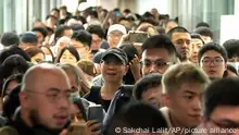 Chinese tourists arrive at Suvarnabhumi International Airport in Samut Prakarn province, Thailand, Monday, Sept. 25, 2023. Thailand, Monday, Sept. 25, 2023. Thailand's new government granting temporary visa-free entry to Chinese tourists, signaling that the recovery of the country's tourism industry is a top economic priority. (AP Photo/Sakchai Lalit)