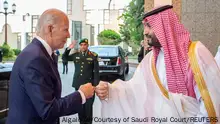 15.07.2022****FILE PHOTO: Saudi Crown Prince Mohammed bin Salman fist bumps U.S. President Joe Biden upon his arrival at Al Salman Palace, in Jeddah, Saudi Arabia, July 15, 2022. Bandar Algaloud/Courtesy of Saudi Royal Court/Handout via REUTERS ATTENTION EDITORS - THIS PICTURE WAS PROVIDED BY A THIRD PARTY/File Photo