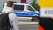 A German police van parked across the road in a representative photo for a story about authorities searching locations across northern, western and southern Germany as part of an investigation into smuggling of Syrian migrants A German police van parked across the road in a representative photo for a story about authorities searching locations across northern, western and southern Germany as part of an investigation into smuggling of Syrian migrants