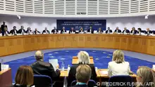 Members of the European Court of Human Rights (ECHR) open a hearing in a climate change case involving six young Portuguese citizens against 32 countries, in Strasbourg, eastern France, on September 27, 2023. The European Court of Human Rights (ECHR) on September 27, 2023, began hearing a case brought by six Portuguese youths against 32 nations for not doing enough to stop global warming, the latest bid to secure climate justice through the courts. (Photo by FREDERICK FLORIN / AFP)