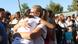 Two women embrace at the school in Jerez de la Frontera, Spain Two women embrace at the school in Jerez de la Frontera, Spain