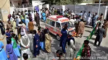 29.09.2023****People gather at a hospital, where injured victims of a bomb explosion are brought, in Quetta, Pakistan, Friday, Sept. 29, 2023. A powerful bomb exploded at a rally celebrating the birthday of Islam's Prophet Muhammad in southwest Pakistan on Friday, killing multiple people and wounding dozens of others, police and a government official said. (AP Photo/Arshad Butt)