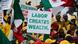 Protesters holds a placards as workers take part in a rally called by trade unions at Alausa, Ikeja, north of Lagos Protesters holds a placards as workers take part in a rally called by trade unions at Alausa, Ikeja, north of Lagos