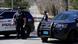 En la imagen de archivo aparecen varios agentes junto a dos patrullas policiales. En la imagen de archivo aparecen varios agentes junto a dos patrullas policiales.