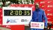 Kenya's Kelvin Kiptum poses next to the clock marking his time after winning the 2023 Bank of America Chicago Marathon Kenya's Kelvin Kiptum poses next to the clock marking his time after winning the 2023 Bank of America Chicago Marathon
