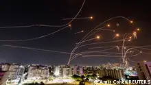 Israel's Iron Dome anti-missile system intercepts rockets launched from the Gaza Strip, as seen from the city of Ashkelon, Israel October 8, 2023. REUTERS/Amir Cohen