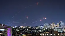 Israel's Iron Dome anti-missile system intercepts rockets launched from the Gaza Strip, as seen from Ashkelon in southern Israel October 9, 2023. REUTERS/Amir Cohen