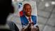A person holds a photo of the late Haitian President Jovenel Moise during his memorial ceremony at the National Pantheon Museum in Port-au-Prince, Haiti, July 20, 2021.r A person holds a photo of the late Haitian President Jovenel Moise during his memorial ceremony at the National Pantheon Museum in Port-au-Prince, Haiti, July 20, 2021.r