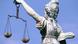 Simbolul justiției: o statuie a zeiței Justitia Simbolul justiției: o statuie a zeiței Justitia