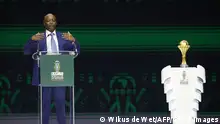 Confederation of African Football (CAF) president Patrice Motsepe delivers a speech next to the trophy during the Africa Cup of Nations (CAN) 2024 official draw at Parc des Expositions in Abidjan, southeastern Ivory Coast, on October 12, 2023. (Photo by WIKUS DE WET / AFP) (Photo by WIKUS DE WET/AFP via Getty Images)