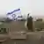 Ізраїльський військовий біля Сектора Гази на танку