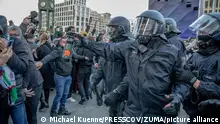 October 15, 2023, Berlin, Germany: On Sunday afternoon, October 15, 2023, approximately 1,000 pro-Palestinian demonstrators gathered at Potsdamer Platz in Berlin despite a ban on such assemblies. The police attempted to disperse the crowd, urging participants to leave. A vigil with about 50 participants was initially registered and approved at Potsdamer Platz. However, pro-Palestinian demonstrators reportedly ''hijacked'' this event. Against the backdrop of the recent terror attack by Hamas on Israel and subsequent Israeli counterattacks, the Berlin police have prohibited gatherings suspected of promoting anti-Semitic or extremist content related to the Middle East conflict. (Credit Image: Â© Michael Kuenne/PRESSCOV via ZUMA Press Wire