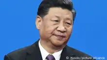中国增发国债救经济 习近平首度视察央行