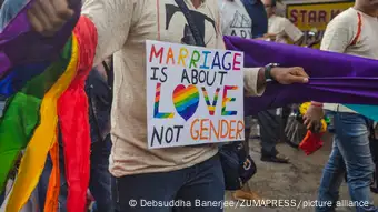 Poster at pride walk in India reading marriage is about love, not gender