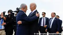 U.S. President Joe Biden is welcomed by Israeli Prime Minster Benjamin Netanyahu, as he visits Israel amid the ongoing conflict between Israel and Hamas, in Tel Aviv, Israel, October 18, 2023. REUTERS/Evelyn Hockstein 
