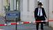 A member of the Jewish community walks behind police tape after Molotov cocktails were thrown at a synagogue in Berlin in October. A member of the Jewish community walks behind police tape after Molotov cocktails were thrown at a synagogue in Berlin in October.