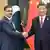中国国家主席习近平10月19日在北京与巴基斯坦总理卡卡尔会晤