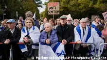 People listen to speeches during a demonstration against antisemitism and to show solidarity with Israel in Berlin, Germany, Sunday, Oct. 22, 2023. (AP Photo/Markus Schreiber)